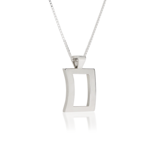 Side view of Silk Edge pendant necklace, tarnish-resistant 925 silver fine jewellery, concave rectangle with rectangular cutout, smooth polished finish, sterling silver box chain, Midnight Coast.
