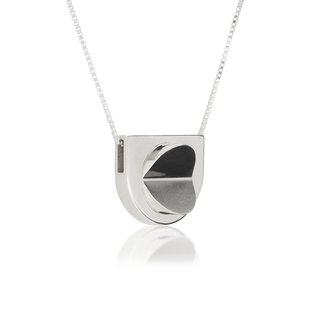 Side view of wedge-shaped Venus Arc pendant necklace, tarnish-resistant 925 silver fine jewellery, stylised open-shell motif, contrasting satin and polished finishes, sterling silver box chain, Midnight Coast.